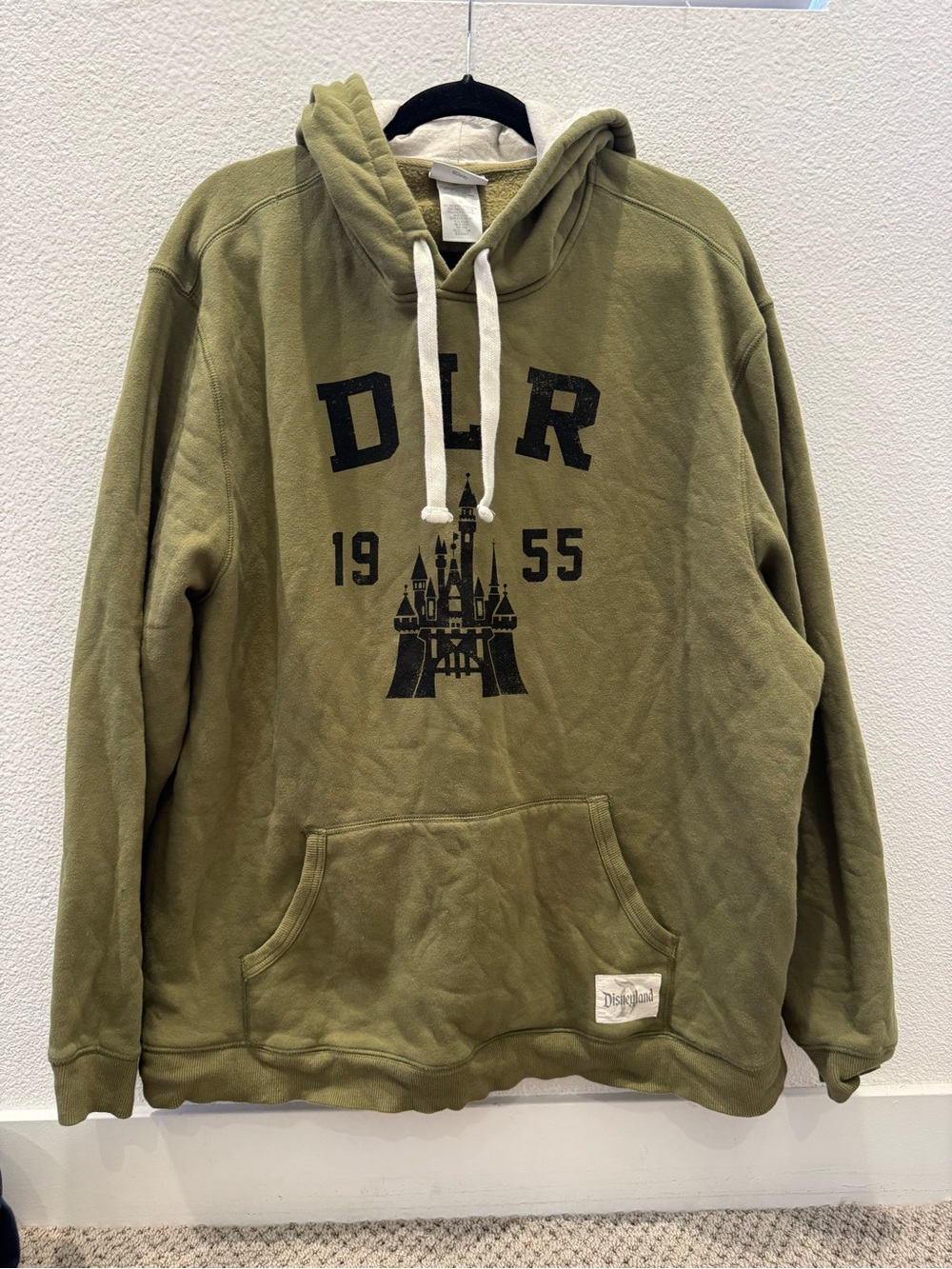 Disneyland pullover hoodie w/ black graphic of a castle & the text "DLR 1955"